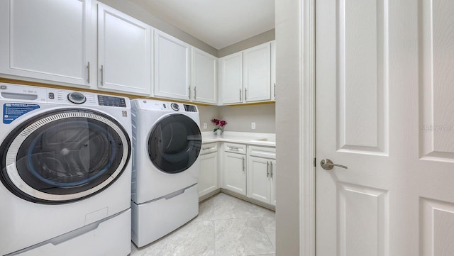 1481 Hyssop Loop, North Port, FL 34289 - laundry area featuring separate washer and dryer, cabinet space, and light tile patterned floors