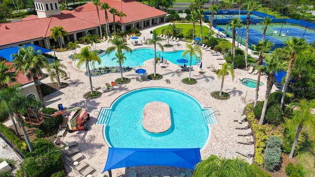 1481 Hyssop Loop, North Port, FL 34289 - community pool featuring a water slide, a water play area, and a patio