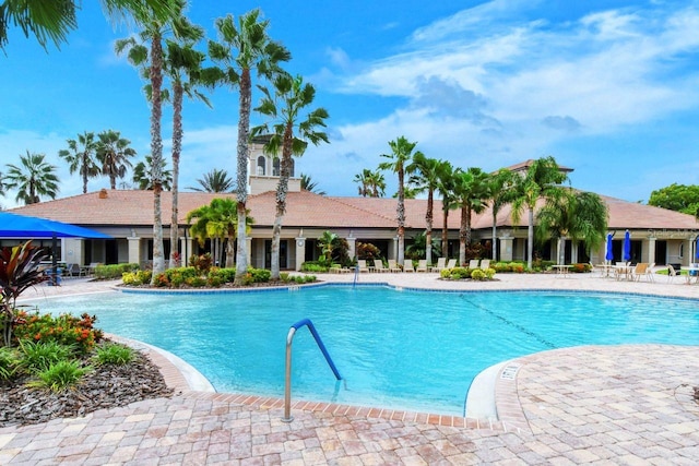 1481 Hyssop Loop, North Port, FL 34289 - community pool featuring a patio area