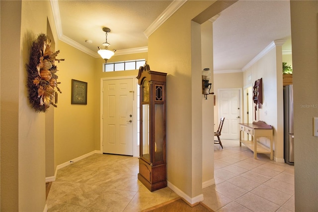 1438 Maseno Dr, Venice, FL 34292 - entrance foyer featuring ornamental molding, light tile patterned floors, and baseboards