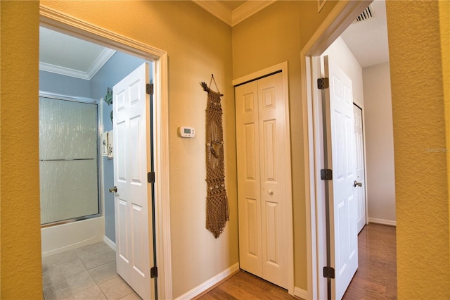 1438 Maseno Dr, Venice, FL 34292 - hall with ornamental molding, baseboards, and light wood-style floors