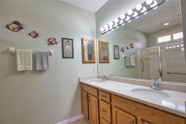 1438 Maseno Dr, Venice, FL 34292 - bathroom with double vanity and a shower stall