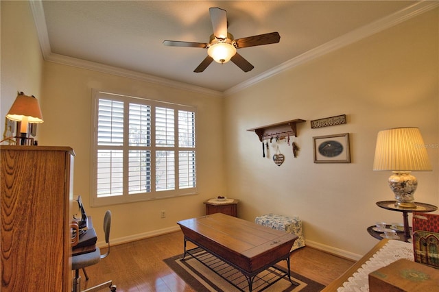1438 Maseno Dr, Venice, FL 34292 - home office with ceiling fan, healthy amount of natural light, wood finished floors, baseboards, and ornamental molding