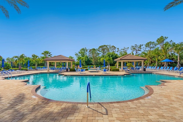 1438 Maseno Dr, Venice, FL 34292 - community pool with a gazebo and a patio area