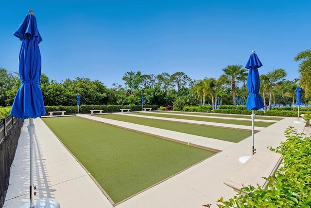 1438 Maseno Dr, Venice, FL 34292 - view of property's community with a bocce ball area and view of wooded area