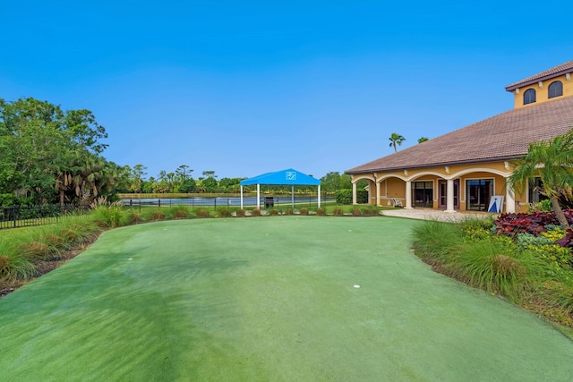 1438 Maseno Dr, Venice, FL 34292 - view of yard featuring a putting green and a water view