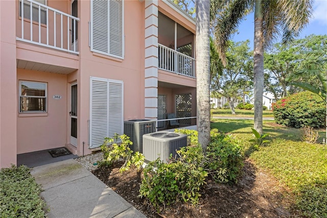 458 Cerromar Rd Unit 382, Venice, FL 34293 - entrance to property with stucco siding and central AC