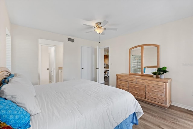 458 Cerromar Rd Unit 382, Venice, FL 34293 - bedroom featuring light wood-style flooring, baseboards, and a ceiling fan