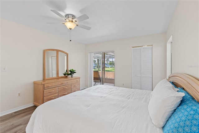 458 Cerromar Rd Unit 382, Venice, FL 34293 - bedroom featuring access to exterior, wood finished floors, baseboards, and ceiling fan