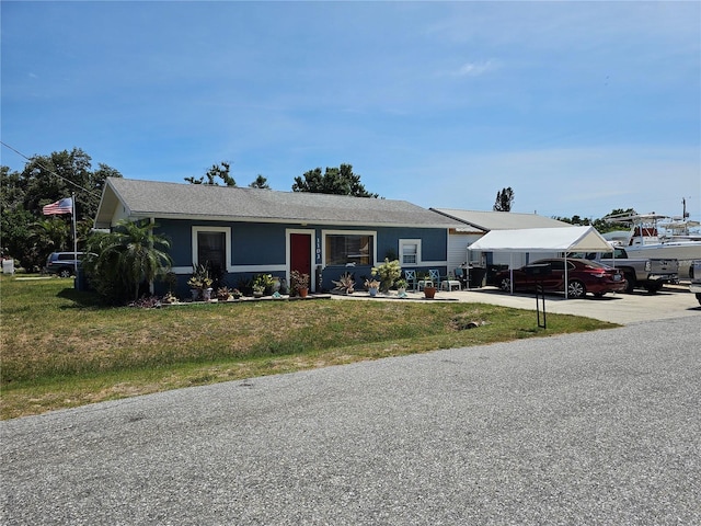 1103 Lucille Ave, Nokomis, FL 34275 - ranch-style home featuring a front yard