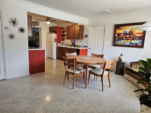 1103 Lucille Ave, Nokomis, FL 34275 - dining room featuring crown molding and ceiling fan