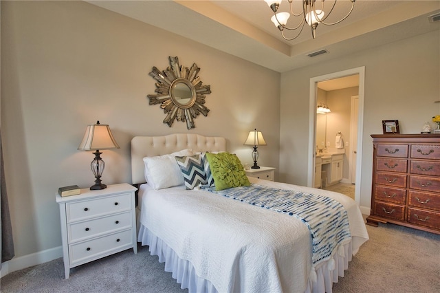 10410 Inglenook Ter, Palmetto, FL 34221 - bedroom with carpet floors, a chandelier, ensuite bathroom, and baseboards