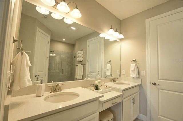 10410 Inglenook Ter, Palmetto, FL 34221 - bathroom featuring double vanity and a stall shower