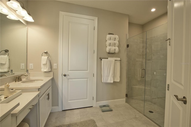 10410 Inglenook Ter, Palmetto, FL 34221 - full bath with vanity, a shower stall, baseboards, tile patterned floors, and recessed lighting