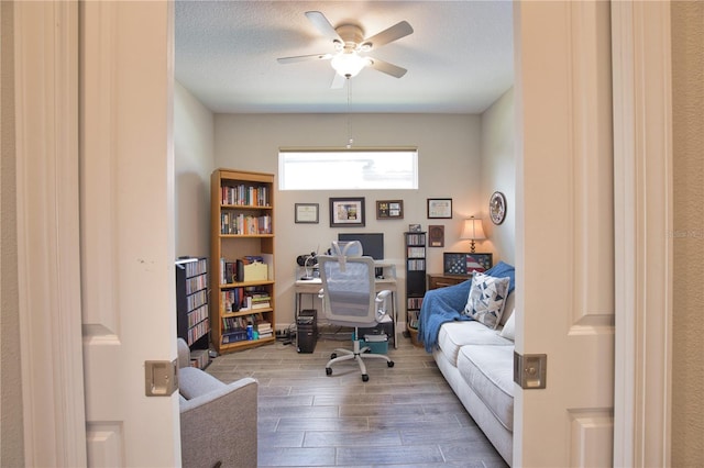 10410 Inglenook Ter, Palmetto, FL 34221 - home office featuring wood finished floors and a ceiling fan
