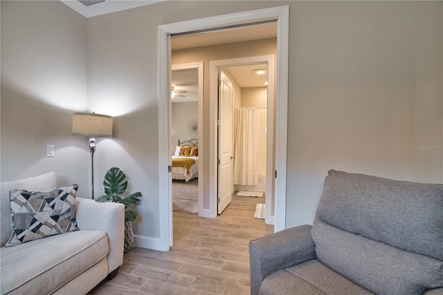 10410 Inglenook Ter, Palmetto, FL 34221 - living area featuring wood finish floors and baseboards
