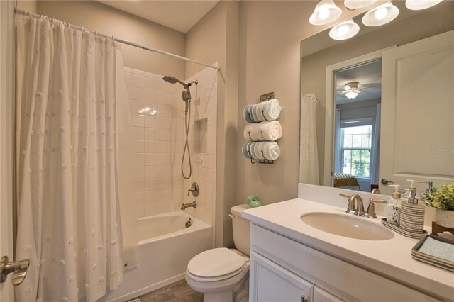 10410 Inglenook Ter, Palmetto, FL 34221 - bathroom featuring toilet, shower / bath combo with shower curtain, and vanity