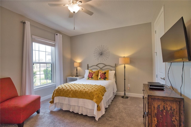 10410 Inglenook Ter, Palmetto, FL 34221 - carpeted bedroom with baseboards and a ceiling fan
