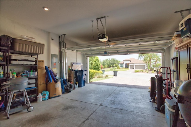 10410 Inglenook Ter, Palmetto, FL 34221 - garage featuring a garage door opener and electric panel
