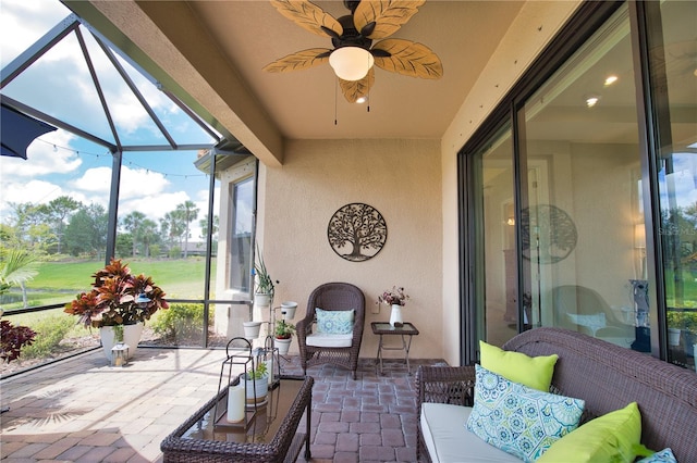 10410 Inglenook Ter, Palmetto, FL 34221 - sunroom with a ceiling fan, outdoor lounge area, and plenty of natural light