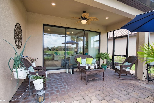 10410 Inglenook Ter, Palmetto, FL 34221 - sunroom with a textured wall, brick flooring, plenty of natural light, and recessed lighting