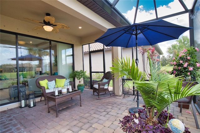 10410 Inglenook Ter, Palmetto, FL 34221 - view of patio with a ceiling fan, a lanai, and an outdoor hangout area