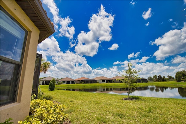 10410 Inglenook Ter, Palmetto, FL 34221 - view of green lawn featuring a water view and a residential view