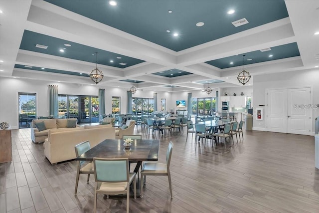 10410 Inglenook Ter, Palmetto, FL 34221 - dining room featuring a chandelier, wood finished floors, coffered ceiling, beam ceiling, and recessed lighting