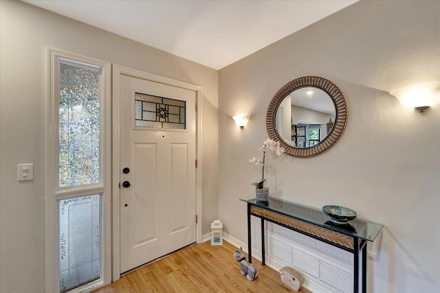 1515 Pecan St, Nokomis, FL 34275 - foyer with light wood finished floors and baseboards
