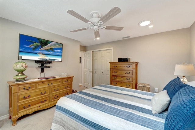 1515 Pecan St, Nokomis, FL 34275 - bedroom with light carpet, a closet, ceiling fan, and recessed lighting