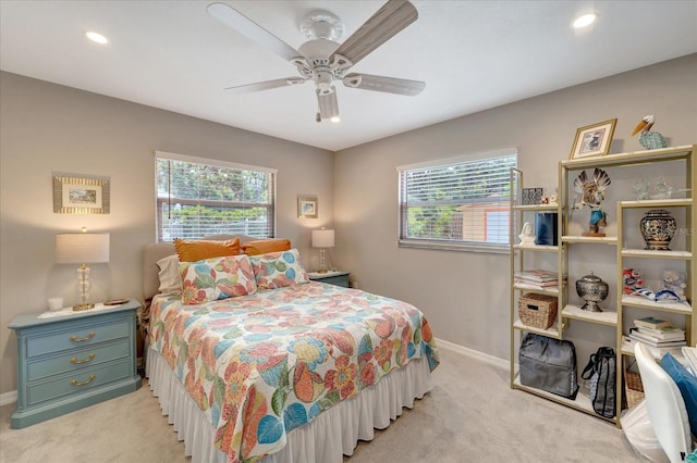 1515 Pecan St, Nokomis, FL 34275 - bedroom featuring light carpet, multiple windows, baseboards, recessed lighting, and ceiling fan