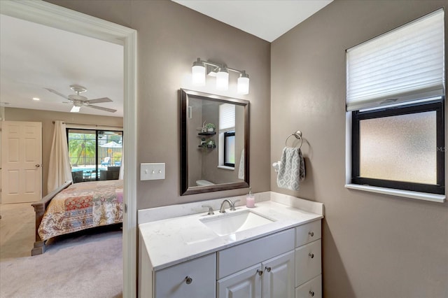 1515 Pecan St, Nokomis, FL 34275 - bathroom with vanity, connected bathroom, and a ceiling fan