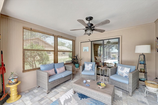 1515 Pecan St, Nokomis, FL 34275 - living room featuring a ceiling fan and stone finish flooring
