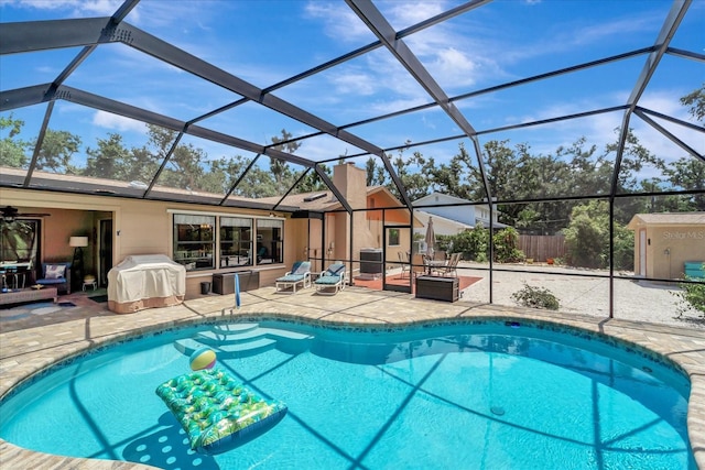 1515 Pecan St, Nokomis, FL 34275 - view of swimming pool with a patio area, area for grilling, and a lanai
