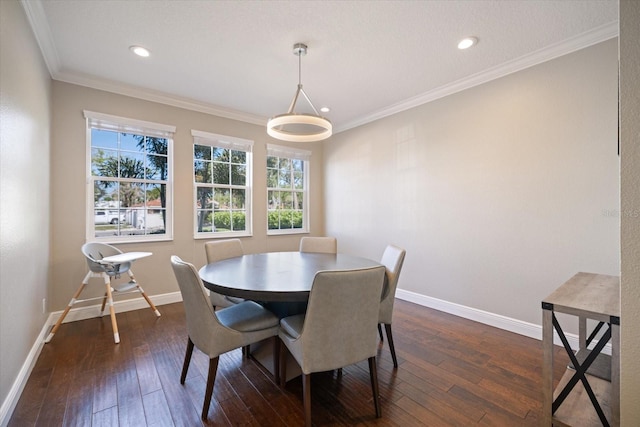 2322 Bayshore Rd, Nokomis, FL 34275 - dining area featuring baseboards, dark wood finished floors, crown molding, and recessed lighting
