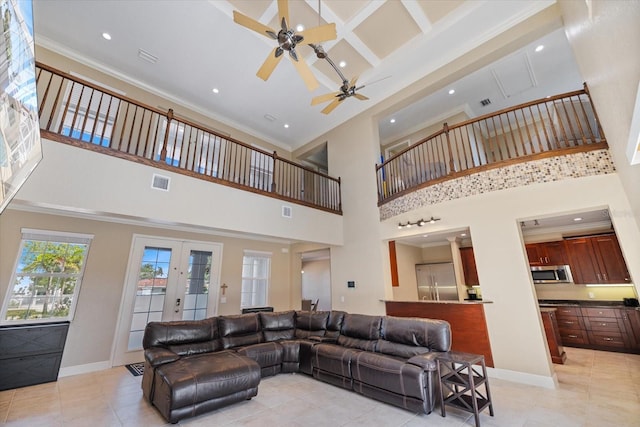 2322 Bayshore Rd, Nokomis, FL 34275 - living room featuring a ceiling fan, a high ceiling, light tile patterned flooring, recessed lighting, and french doors