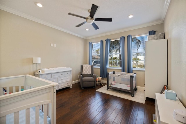 2322 Bayshore Rd, Nokomis, FL 34275 - bedroom with multiple windows, a crib, dark wood-style flooring, baseboards, and crown molding