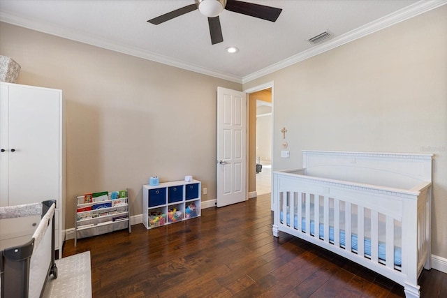 2322 Bayshore Rd, Nokomis, FL 34275 - bedroom featuring recessed lighting, wood-type flooring, a nursery area, crown molding, and baseboards