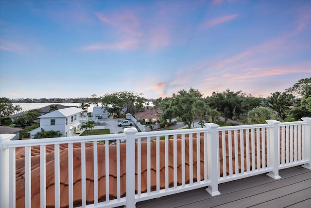 2322 Bayshore Rd, Nokomis, FL 34275 - wooden deck with a residential view
