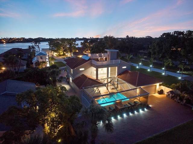 2322 Bayshore Rd, Nokomis, FL 34275 - aerial view at dusk of view of pool