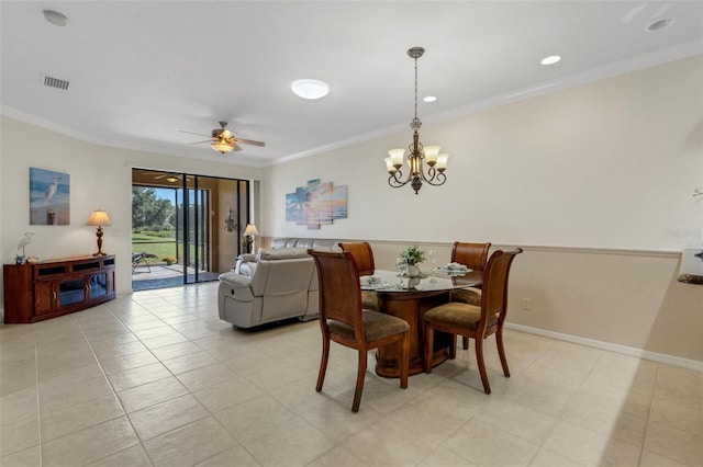 2104 Batello Dr, Venice, FL 34292 - dining space with ornamental molding, a chandelier, and a ceiling fan
