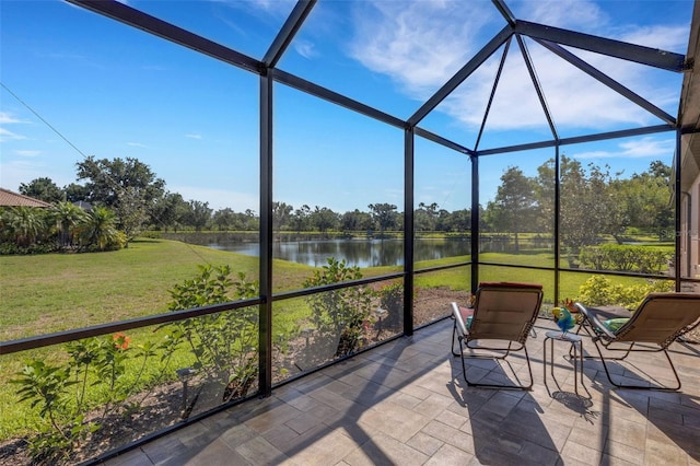 2104 Batello Dr, Venice, FL 34292 - sunroom with a water view and view of scattered trees