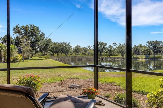 2104 Batello Dr, Venice, FL 34292 - view of green lawn with a water view and view of scattered trees