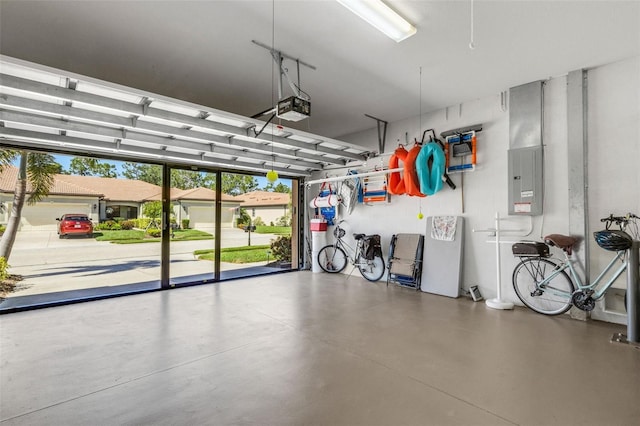 2104 Batello Dr, Venice, FL 34292 - garage with a garage door opener and electric panel