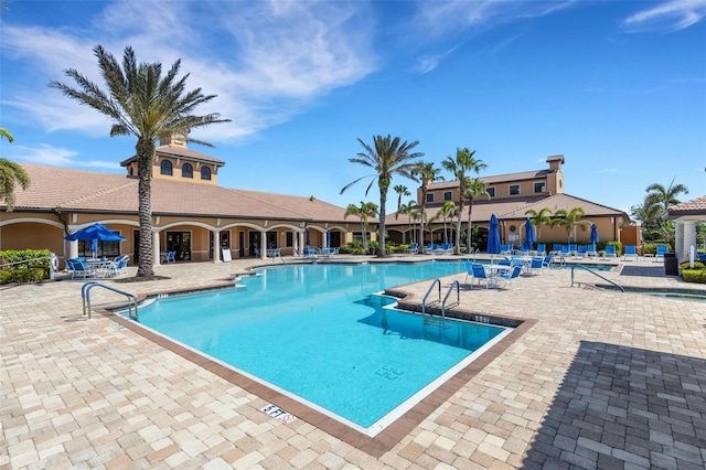 2104 Batello Dr, Venice, FL 34292 - community pool featuring a patio