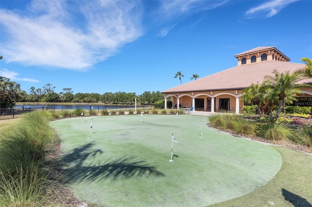2104 Batello Dr, Venice, FL 34292 - view of property's community featuring a water view and a putting green