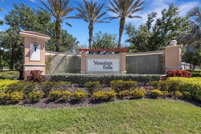 2104 Batello Dr, Venice, FL 34292 - community sign with a lawn