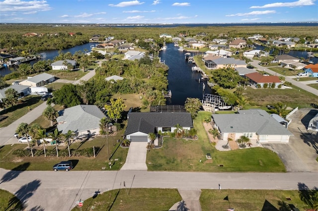 5140 Administration St, Port Charlotte, FL 33948 - aerial view of property's location featuring a large body of water and nearby suburban area