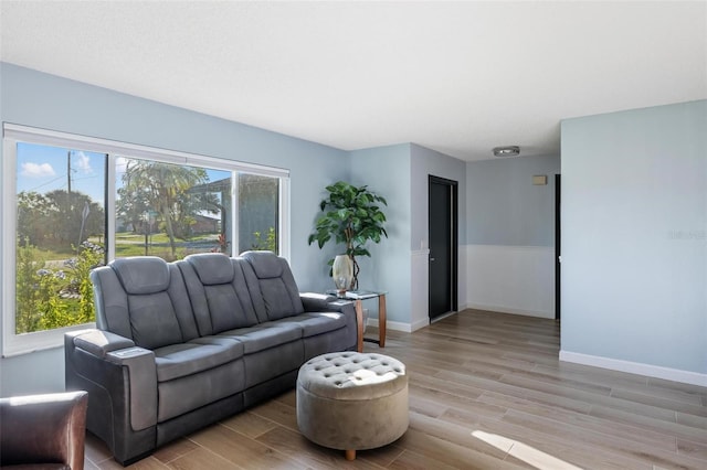 5140 Administration St, Port Charlotte, FL 33948 - living area with light wood-type flooring and baseboards