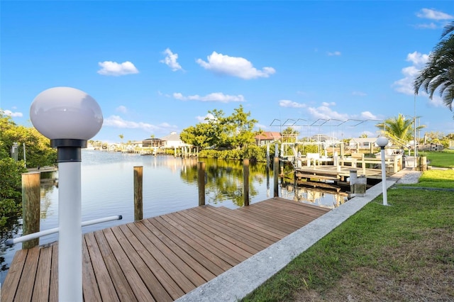 5140 Administration St, Port Charlotte, FL 33948 - dock area featuring a water view, boat lift, and a yard